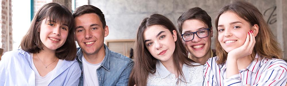 Group of teenagers looking at the camera