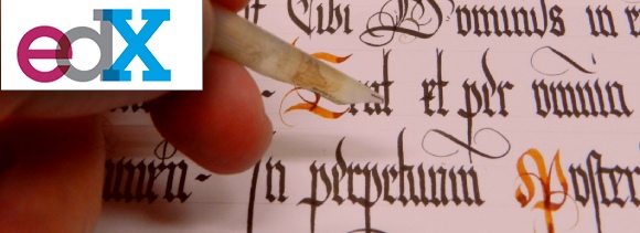 Mano con pluma de cálamo sobre un lienzo con escritura manuscrita gótica